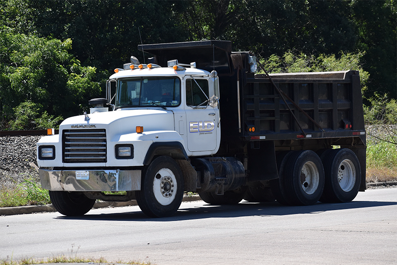 ELD Field Services, excavator contractor, hauling & excavation diesel dump truck.